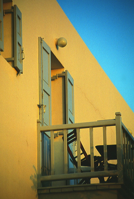 Solitary chair overlooking Aegean sea in Mykonos